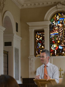 Neil Lyon speaking at Lamport church about the history of the family, the church, and the estate